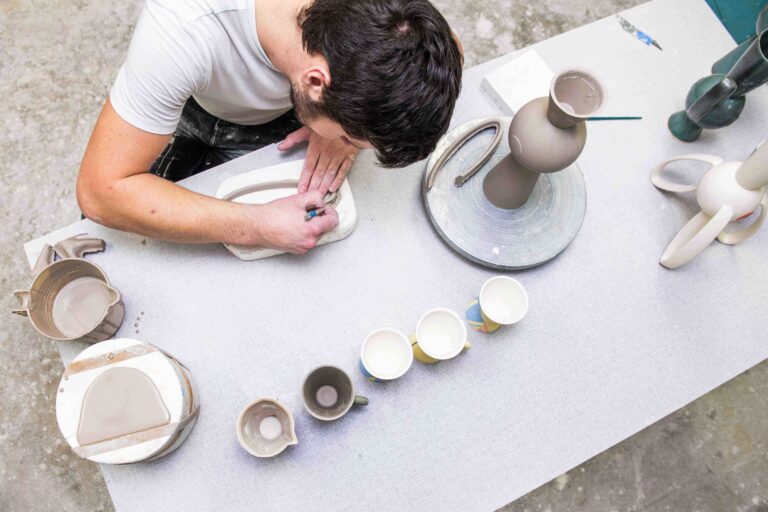 Student creates ceramic work at the intersection of technology, art, and design